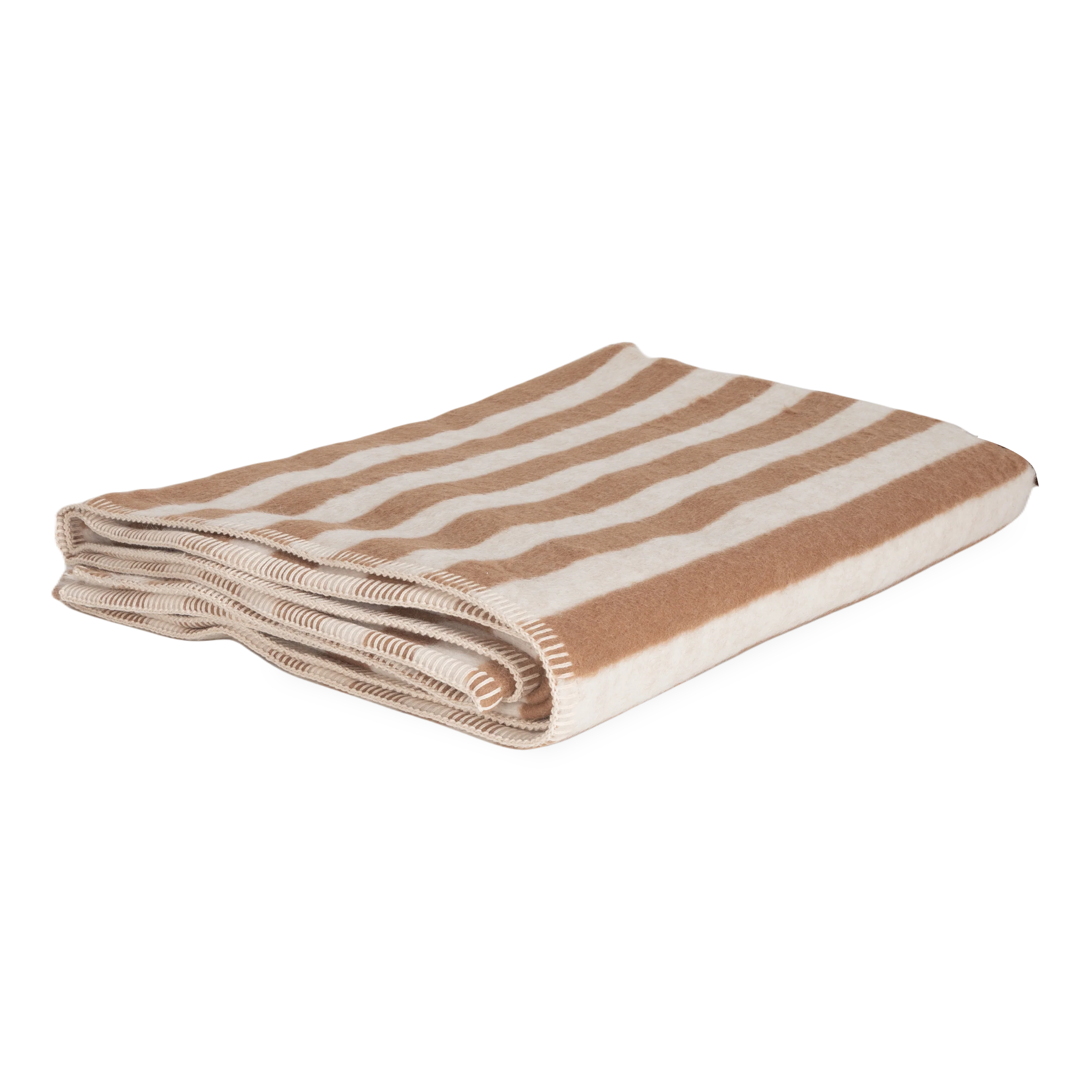 Presenting a luxuriously soft texture, the Stills Stripe Throw is woven with natural superfine alpaca wool and undyed Peruvian cotton.