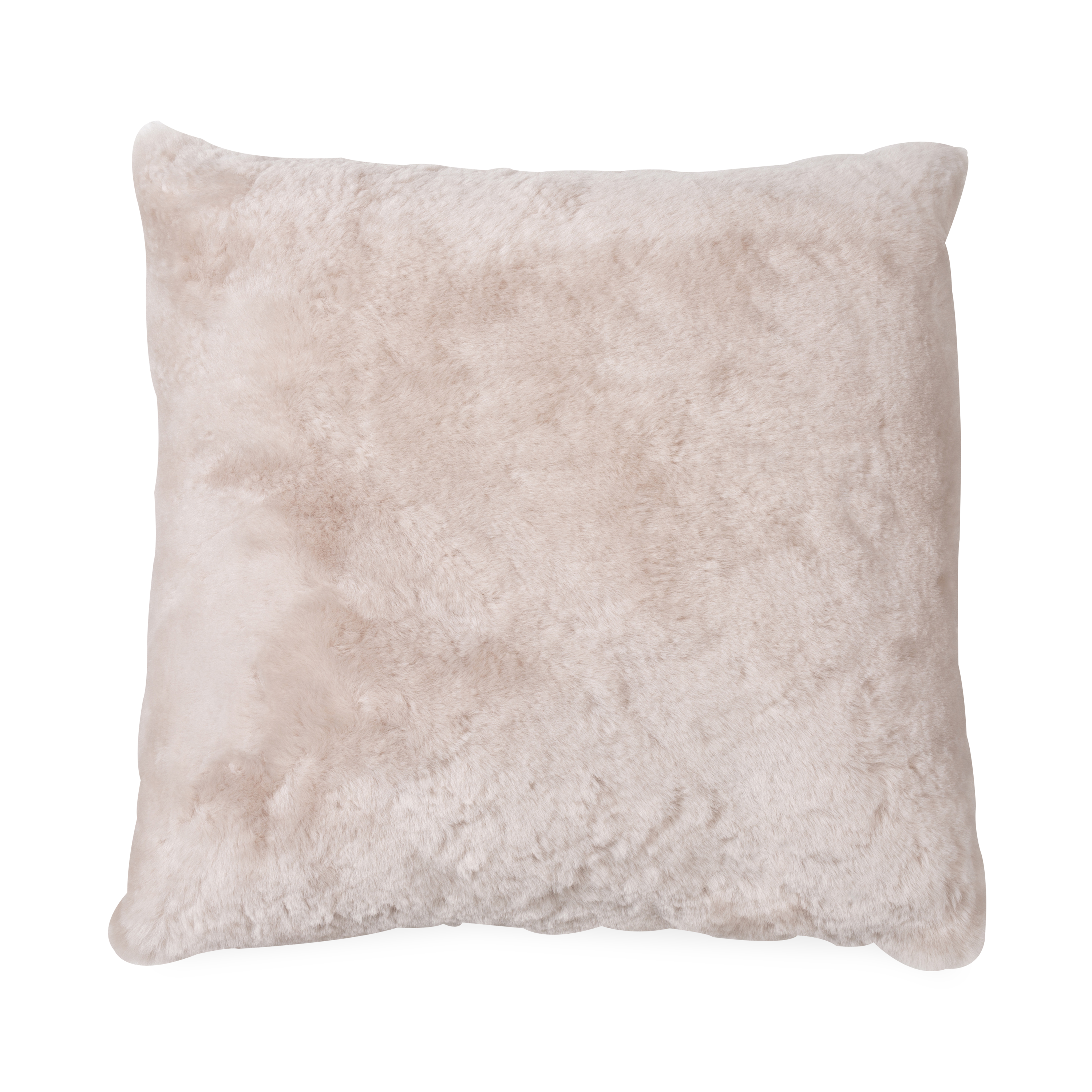 The Shorn Sheepskin Pillow in a oat palette that features a soft and plush texture.