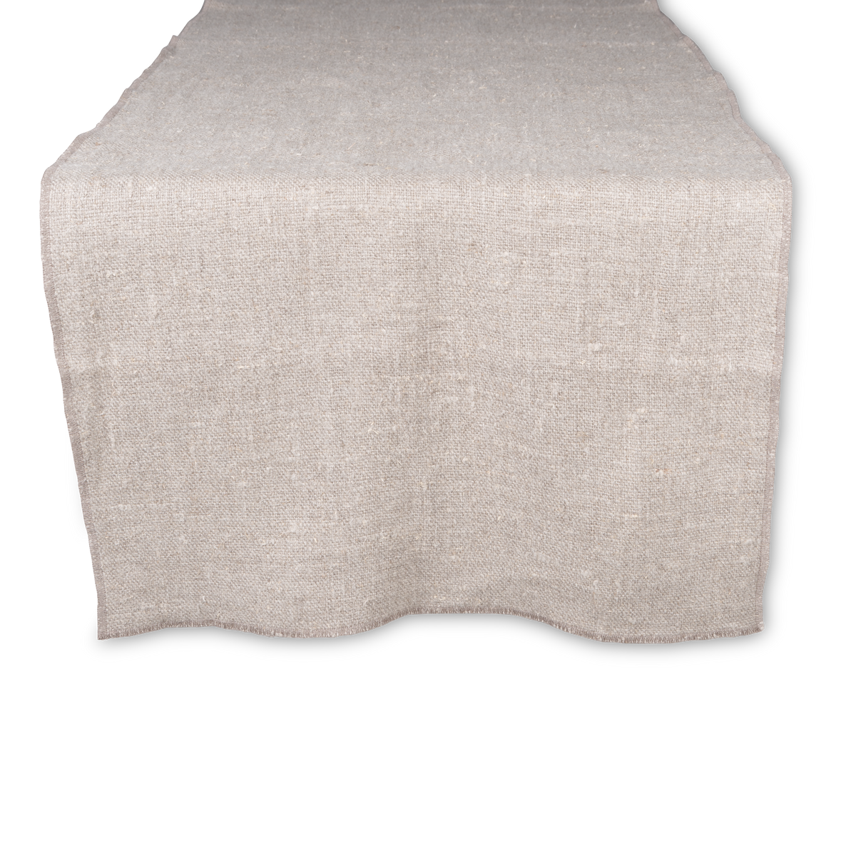 The Slubby Linen Runner in relaxed textural linen features tonal border stitching.
