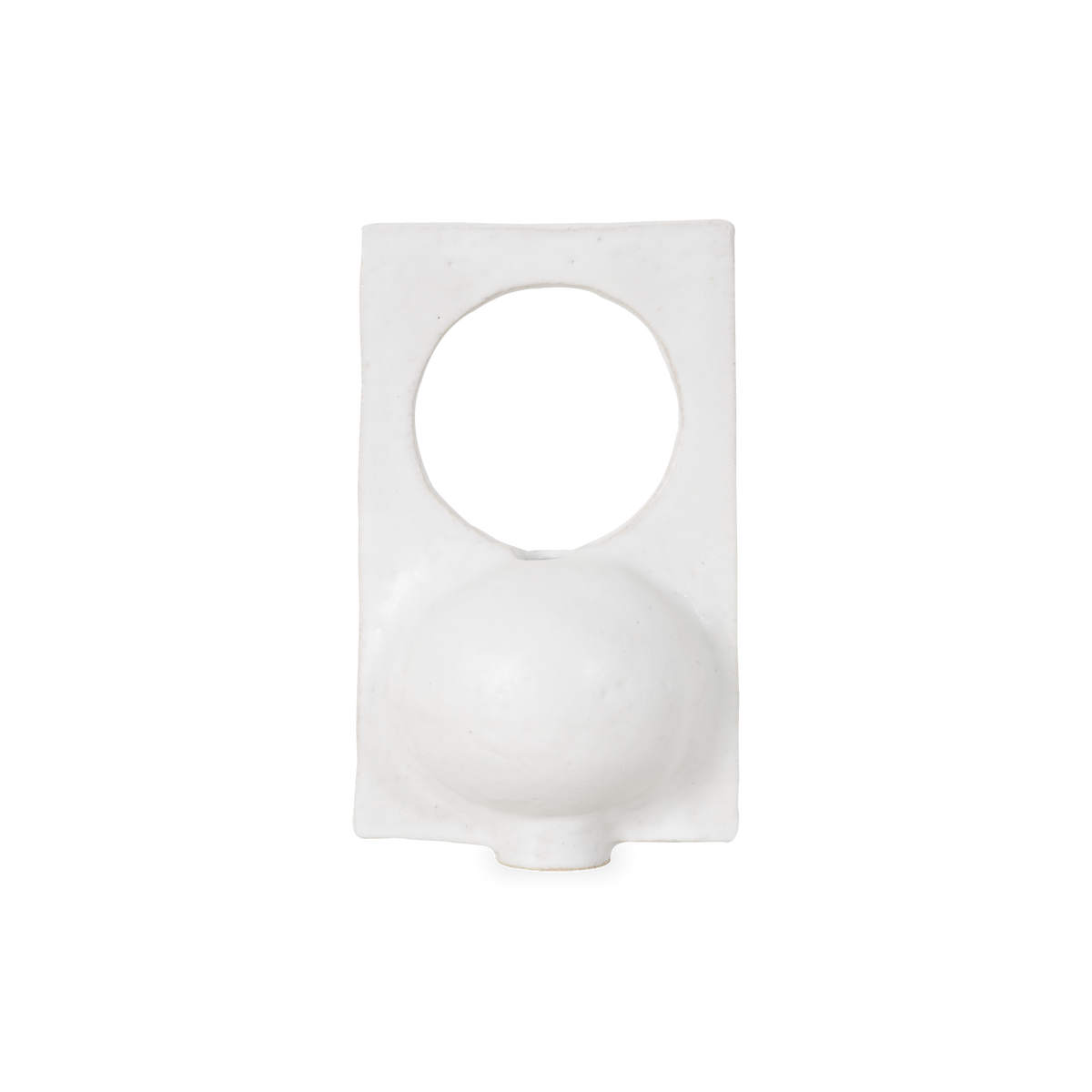 Featuring a round body with a circular negative space, The Santi Vessel is hand-sculpted and glazed in a white semi-matte crystalline color.
