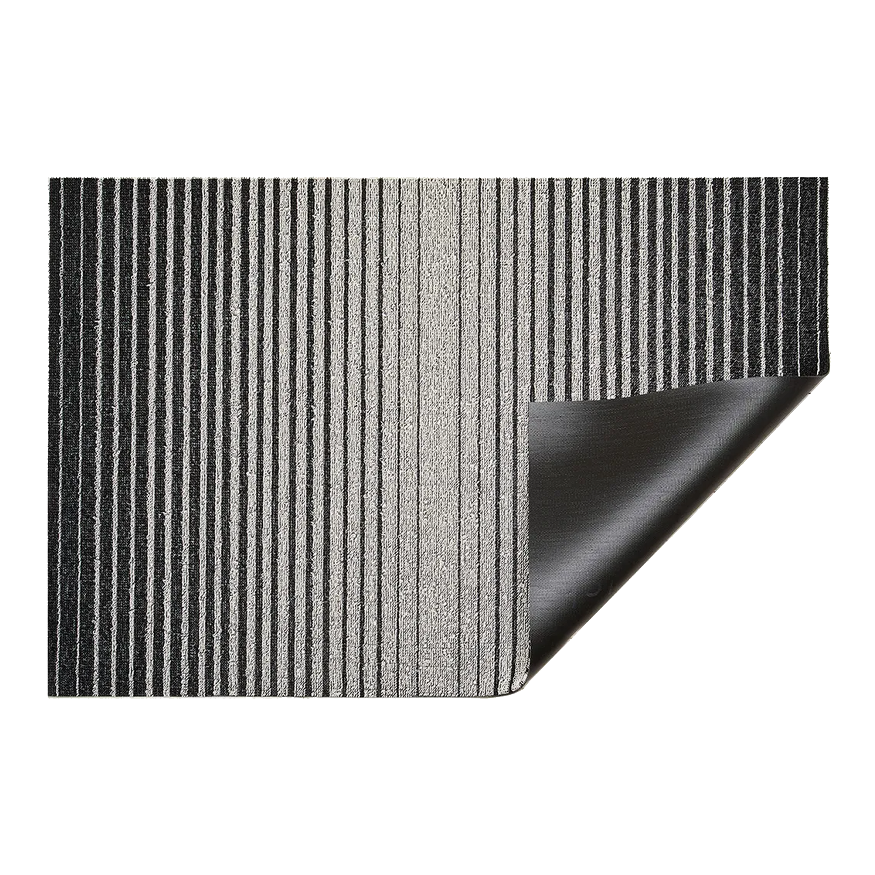 Inspired by the sharp contrast and mesmerizing motion of a cascading row of dominoes, the variegated stripes of this easy-care floor mat are at once dynamic and serene.