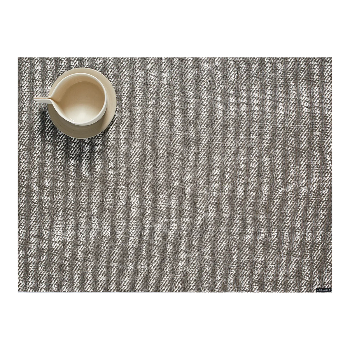 With centuries-old art and craft of imitating wood—this Woodgrain Placemat gains its distinctive look from faithfully recreated patterns originally formed by the burls, knots, gr