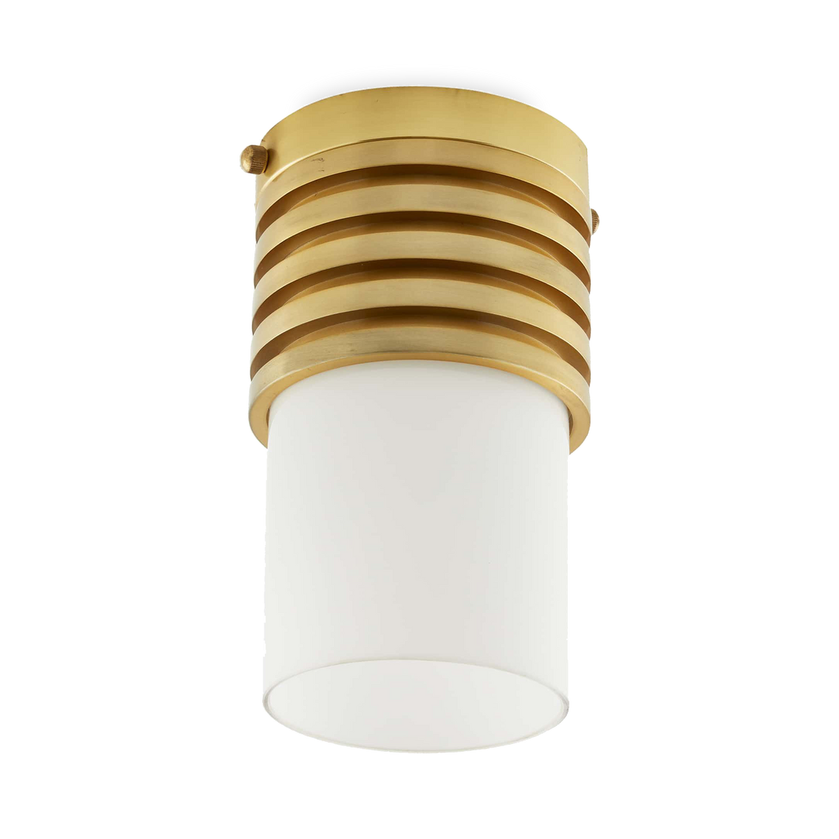 Formed with a machine look, as if it was turned on a lathe, The Rune Flush Mount is finished in antique brass steel with an opal glass cylinder shade.