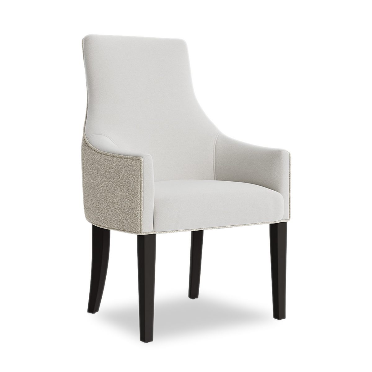 Tall and slender, the Ada Dining Armchair has a sculpted form with a curved back and low, sloping arms that fit easily under a dining table.