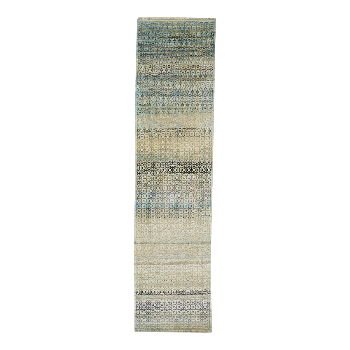 Designed to be passed through generations, the New Heirloom Rug Collection is crafted from recycled and upcycled wool, cocoon silk and sari silk.