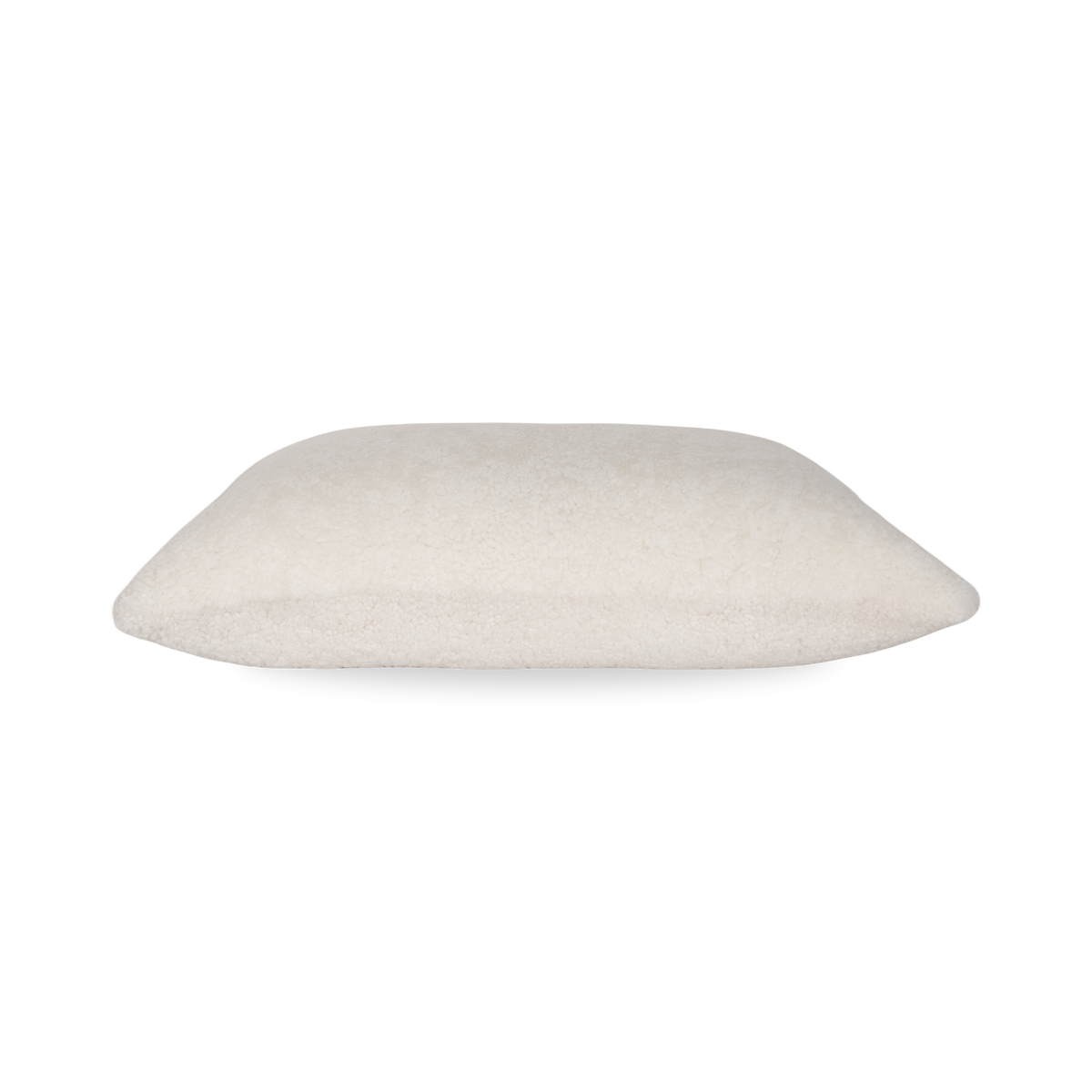 With a welcoming, soft exterior, the Sheepskin Pillow features a neutral beige tone on real sheepskin from Denmark.