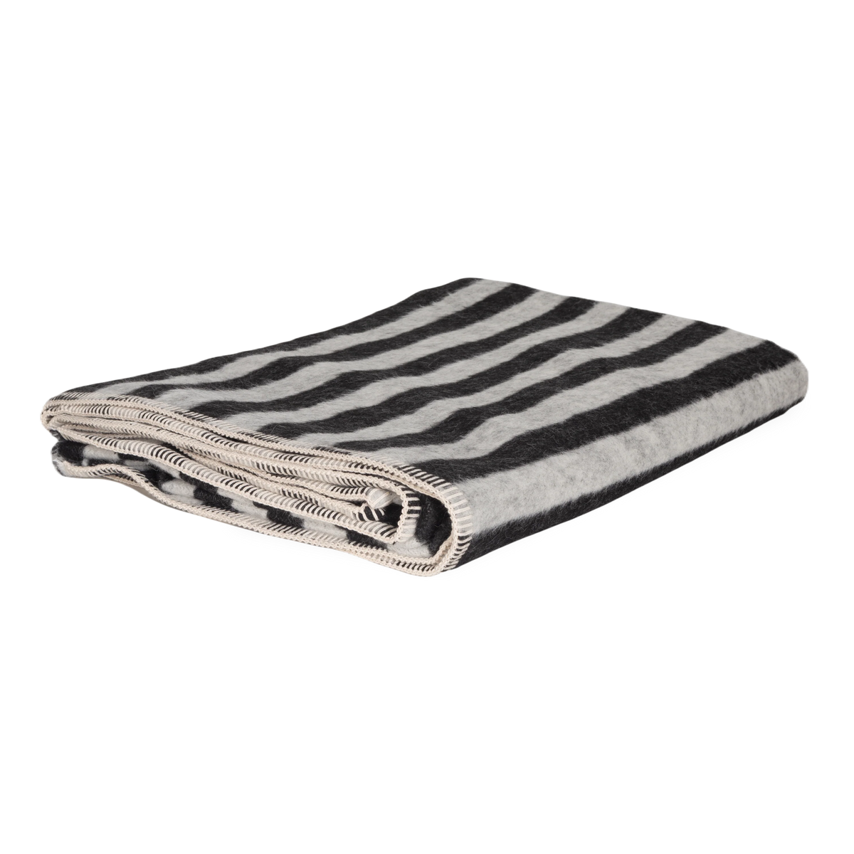Presenting a luxuriously soft texture, the Stills Stripe Throw is woven with natural superfine alpaca wool and undyed Peruvian cotton.