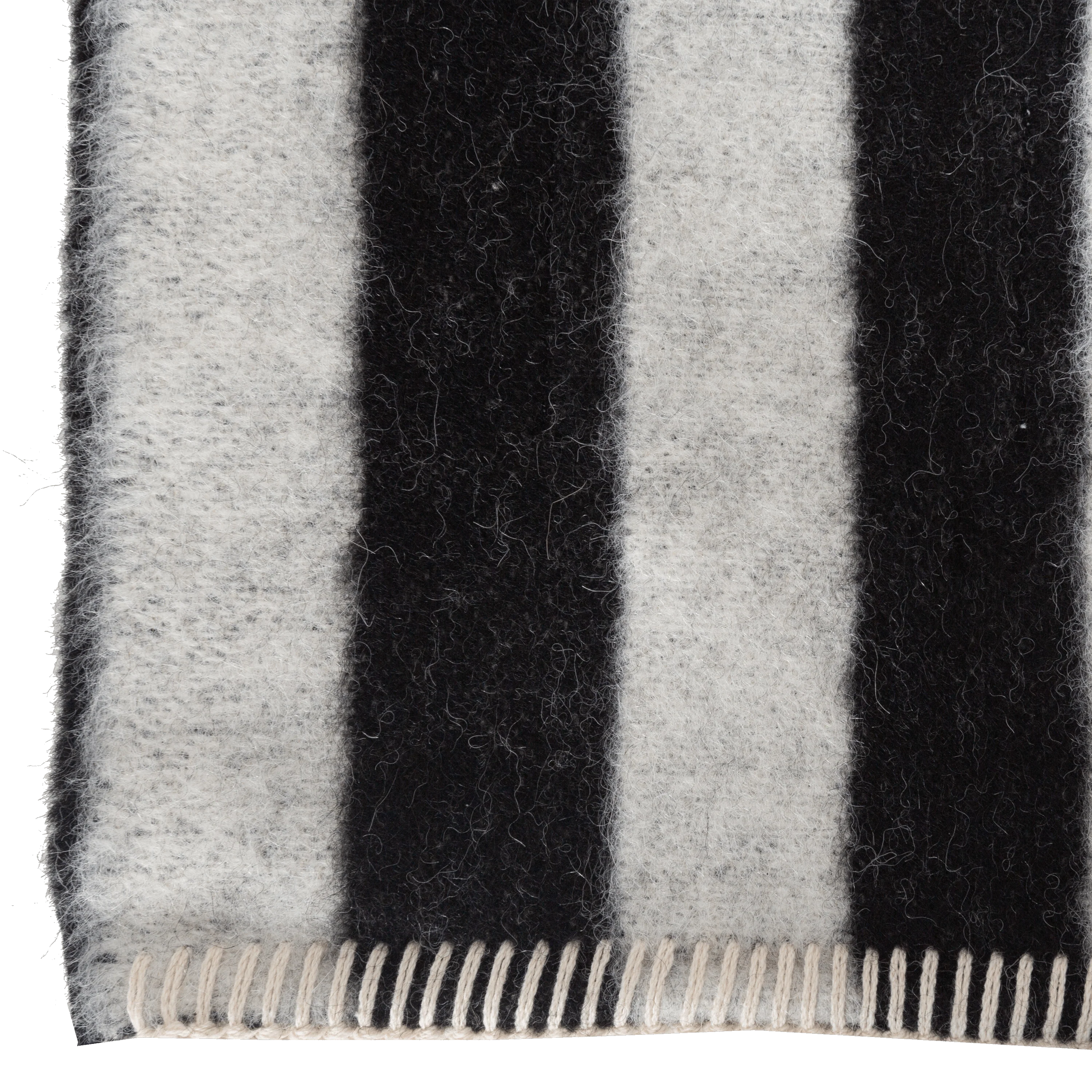 Presenting a luxuriously soft texture, the Stills Stripe Throw is woven with natural superfine alpaca wool and undyed Peruvian cotton.
