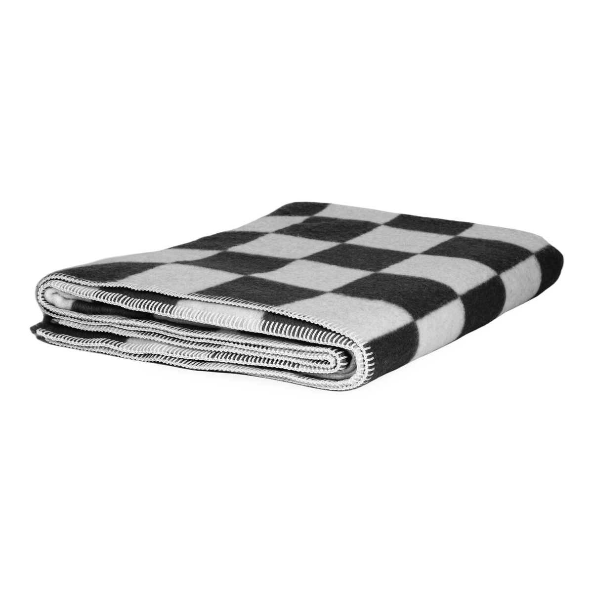 Presenting a luxuriously soft texture, the Crosby Check Throw is woven with natural superfine alpaca wool and undyed Peruvian cotton.