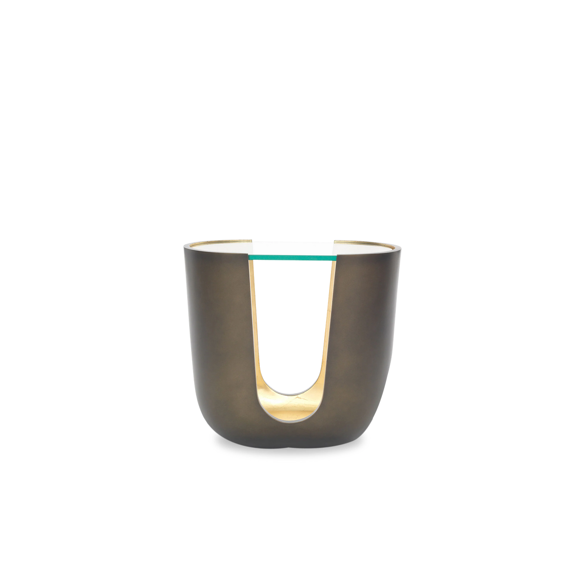 With its cut-out base and contrasting metallic interior, the Vessel Side Table strikes a luxurious note.